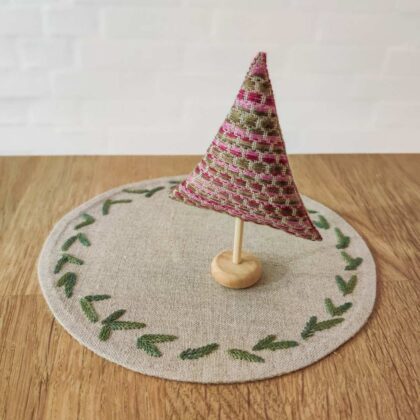 Rund flakon serviet med gran og juletræ